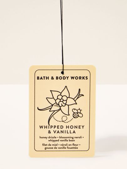 Zawieszka Whipped Honey & Vanilla Bath & Body Works w kremowym odcieniu z delikatnym, słodkim akcentem.