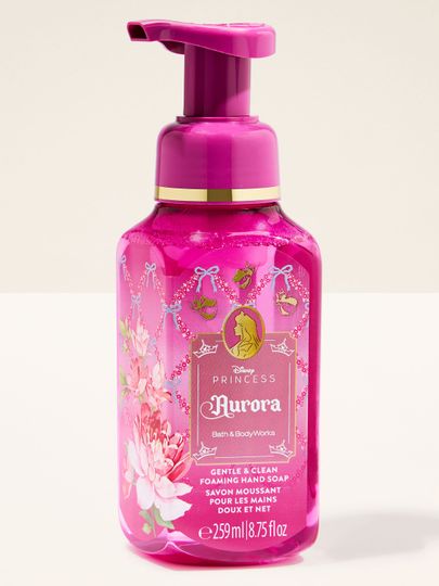 Kremowe mydło w piance Aurora od Bath & Body Works w różowym flakonie z kwiatowym motywem i złotymi detalami.