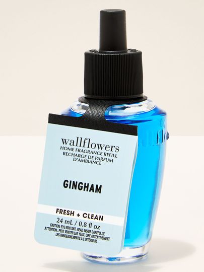 Wkład Wallflowers Gingham o świeżej, czystej nucie w intensywnie niebieskiej butelce 24 ml.