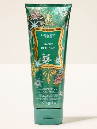 Krem do ciała Magic in the Air Bath & Body Works z motywem płatków śniegu, gwiazd i złotych detali