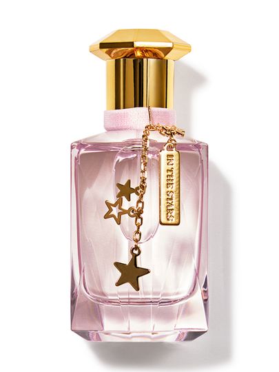Parfum „In the Stars” în flacon roz cu capac auriu și breloc, Bath & Body Works.