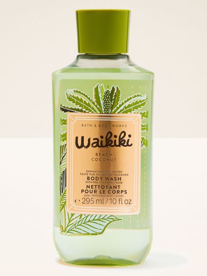 Żel pod prysznic Waikiki Beach Coconut w zielonej butelce z tropikalną etykietą i zielonym korkiem.