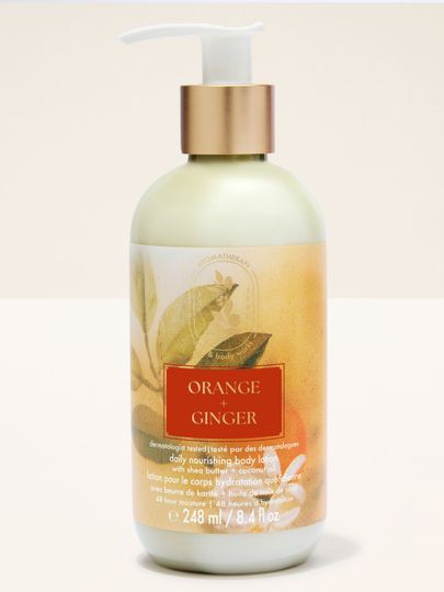 Balsam do ciała Bath & Body Works Aromatherapy Orange + Ginger 248 ml w jasnej butelce z pompką.