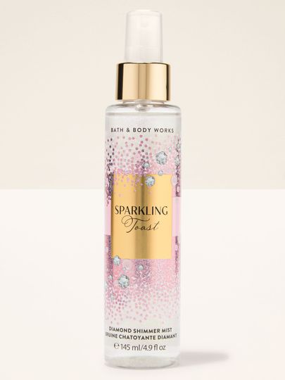 Mgiełka Diamond Shimmer Mist Sparkling Toast Bath & Body Works w różowo‑złotej butelce z brokatem