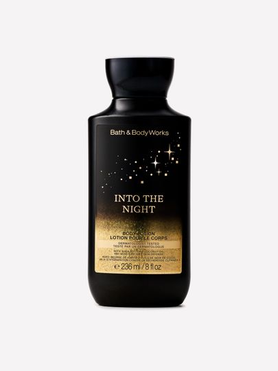 Balsam do ciała Into the Night Bath & Body Works w czarnej butelce ze złotym motywem gwiazd