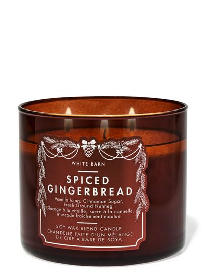 Świeca zapachowa Spiced Gingerbread White Barn z 3 knotami w bursztynowym szklanym słoju