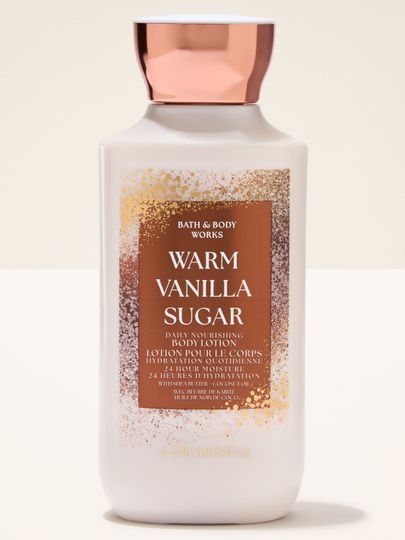 Balsam do ciała Bath & Body Works Warm Vanilla Sugar w jasnej butelce z miedzianą zakrętką