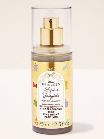 Mini mgiełka zapachowa Life’s a Fairytale od Bath & Body Works w złotym, połyskującym flakonie z motywami księżniczek.