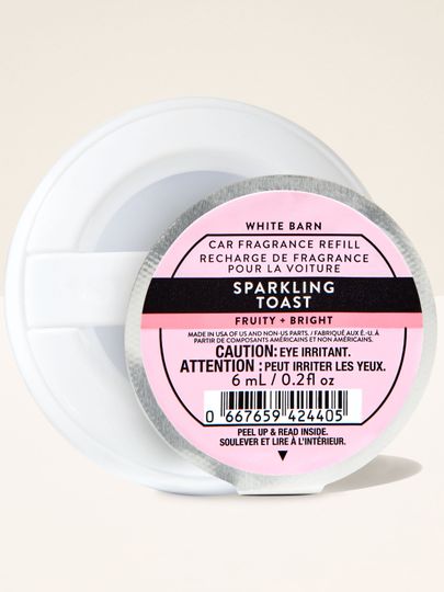 Wkład samochodowy Sparkling Toast Bath & Body Works w okrągłym opakowaniu z różową etykietą