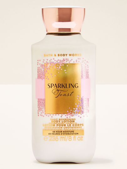 Balsam Sparkling Toast Bath & Body Works w białej butelce ze złotą etykietą i różowymi akcentami