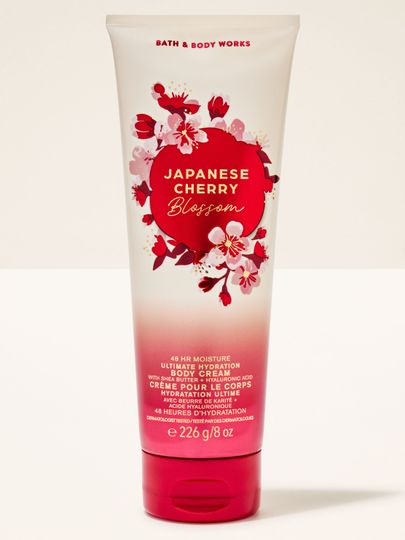 Krem do ciała Japanese Cherry Blossom Bath & Body Works w białej tubie z czerwonymi kwiatami wiśni