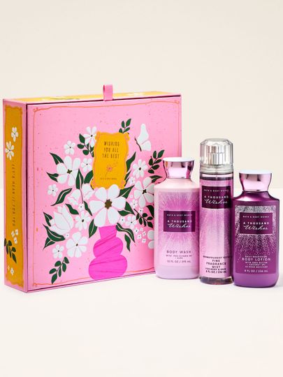 Zestaw prezentowy Bath & Body Works A Thousand Wishes z mgiełką, żelem i balsamem do ciała w ozdobnym pudełku.