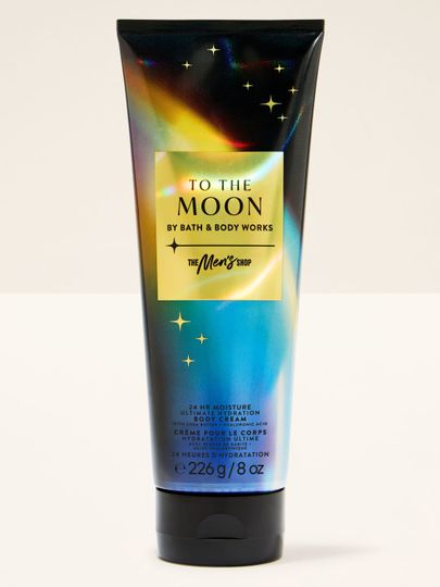 Cremă de corp neagră pentru bărbați cu un motiv spațial și holografic și inscripția „To the Moon”. Bath & Body Works.