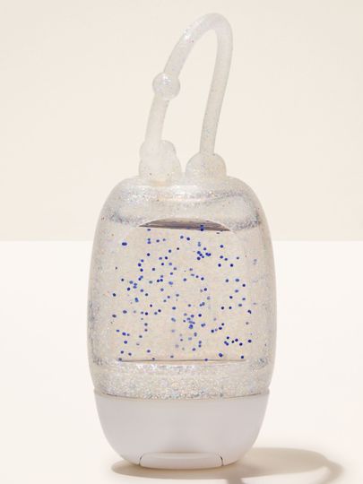 Brokatowy uchwyt PocketBac w elastycznej, żelowej formie, zaprojektowany do wygodnego przypięcia mini żelu antybakteryjnego.