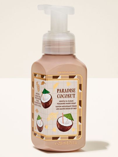 Piankowe mydło do rąk Paradise Coconut od Bath & Body Works w jasnej butelce z pompką i kokosową etykietą.