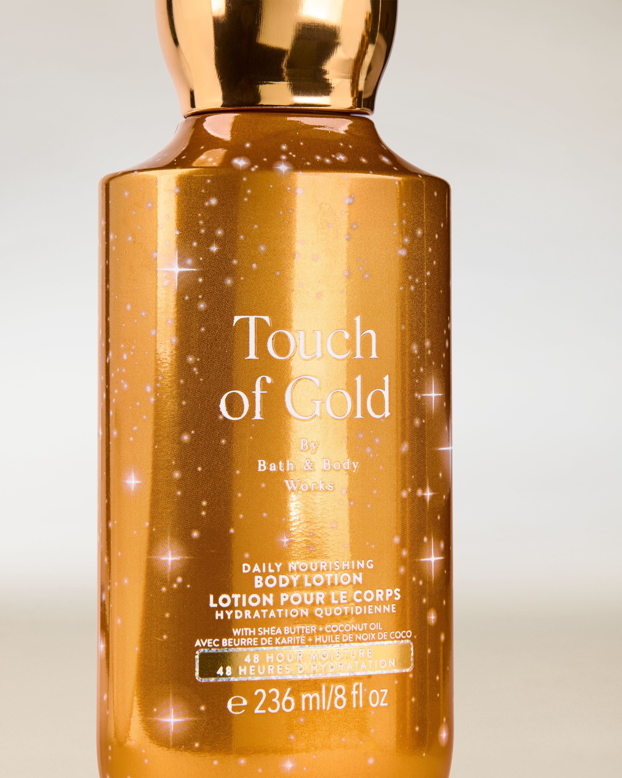 Balsam do ciała Touch of Gold Bath & Body Works w błyszczącym, złotym opakowaniu o nawilżającej formule.