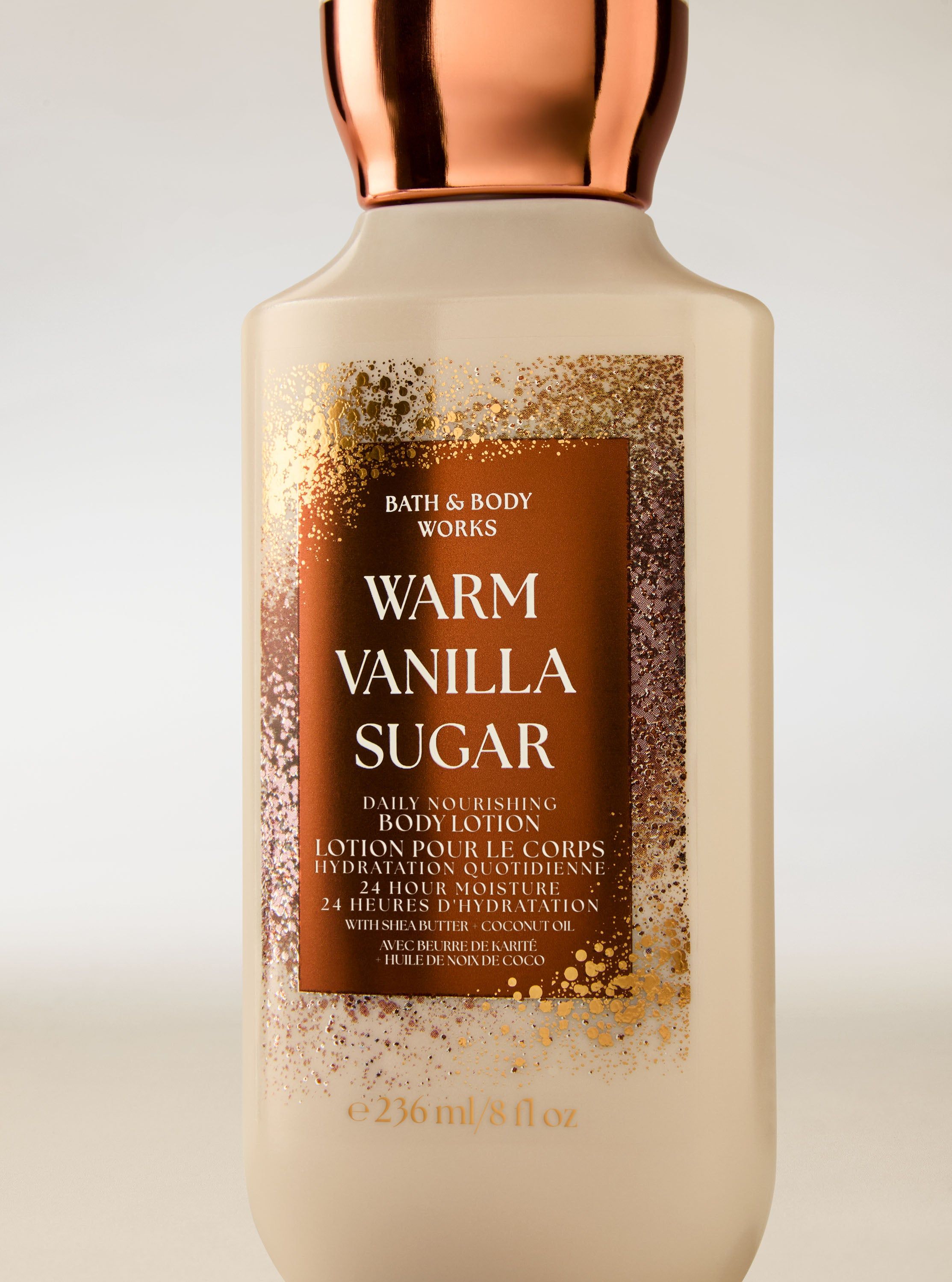 Balsam do ciała Bath & Body Works Warm Vanilla Sugar w jasnej butelce z miedzianą zakrętką