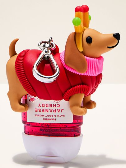 Etui na oczyszczający żel do rąk PocketBac Bath & Body Works w kształcie jamnika w świątecznym swetrze