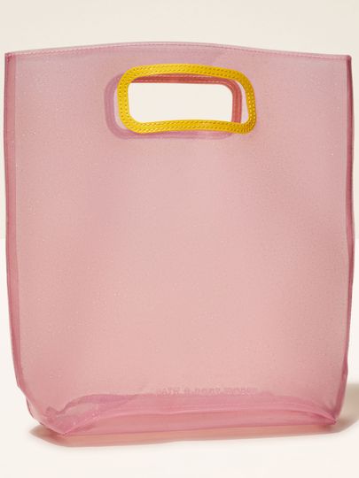 Różowa torba Bath & Body Works z brokatowym wykończeniem, idealna na prezenty z letniej kolekcji.