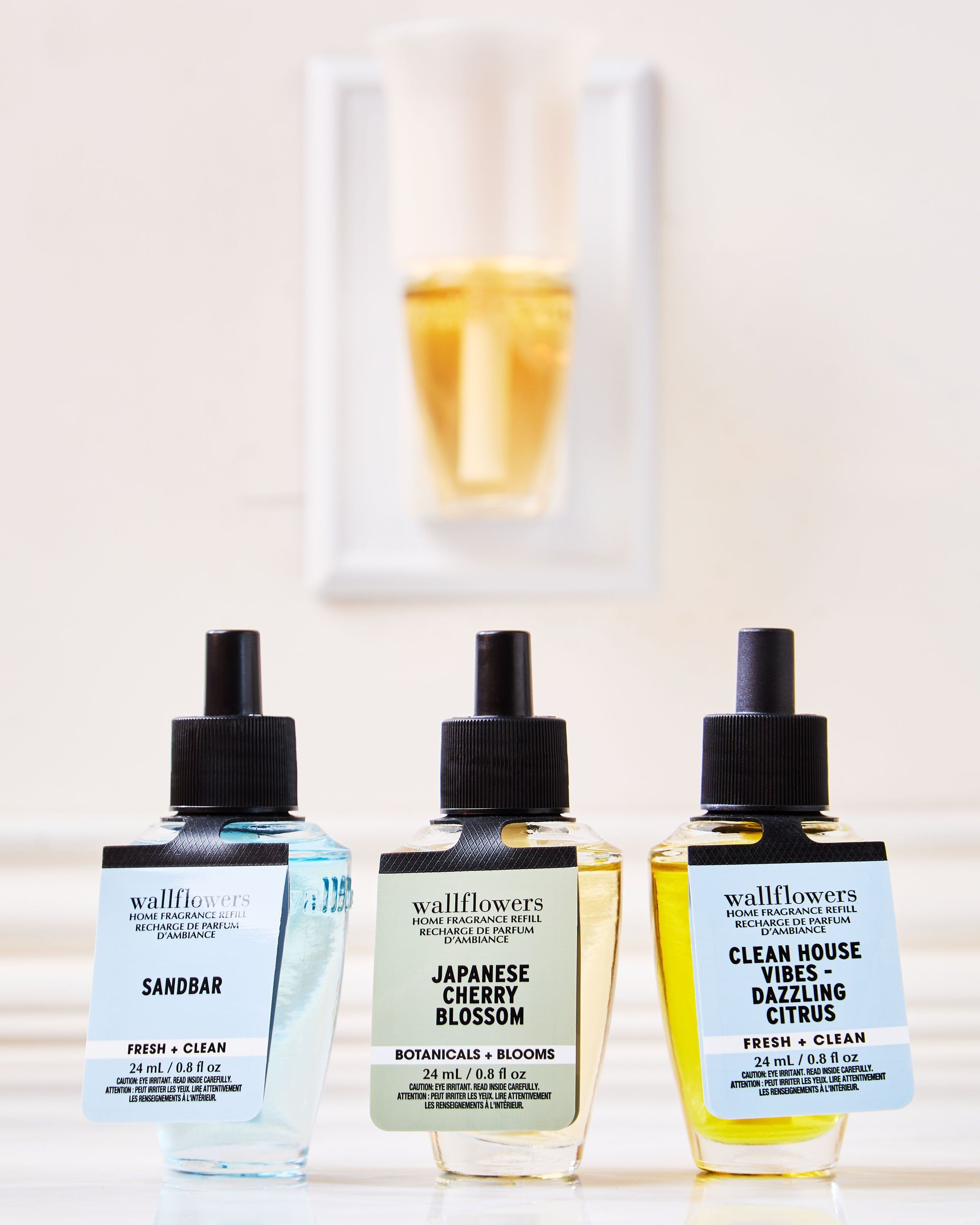 Zestaw trzech wkładów Wallflowers: Sandbar, Japanese Cherry Blossom i Clean House Vibes – Dazzling Citrus.