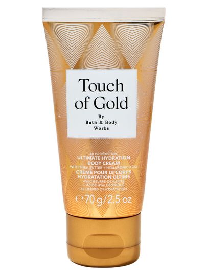 Mini krem do ciała Touch of Gold Bath & Body Works w złotej tubie o intensywnie nawilżającej formule.