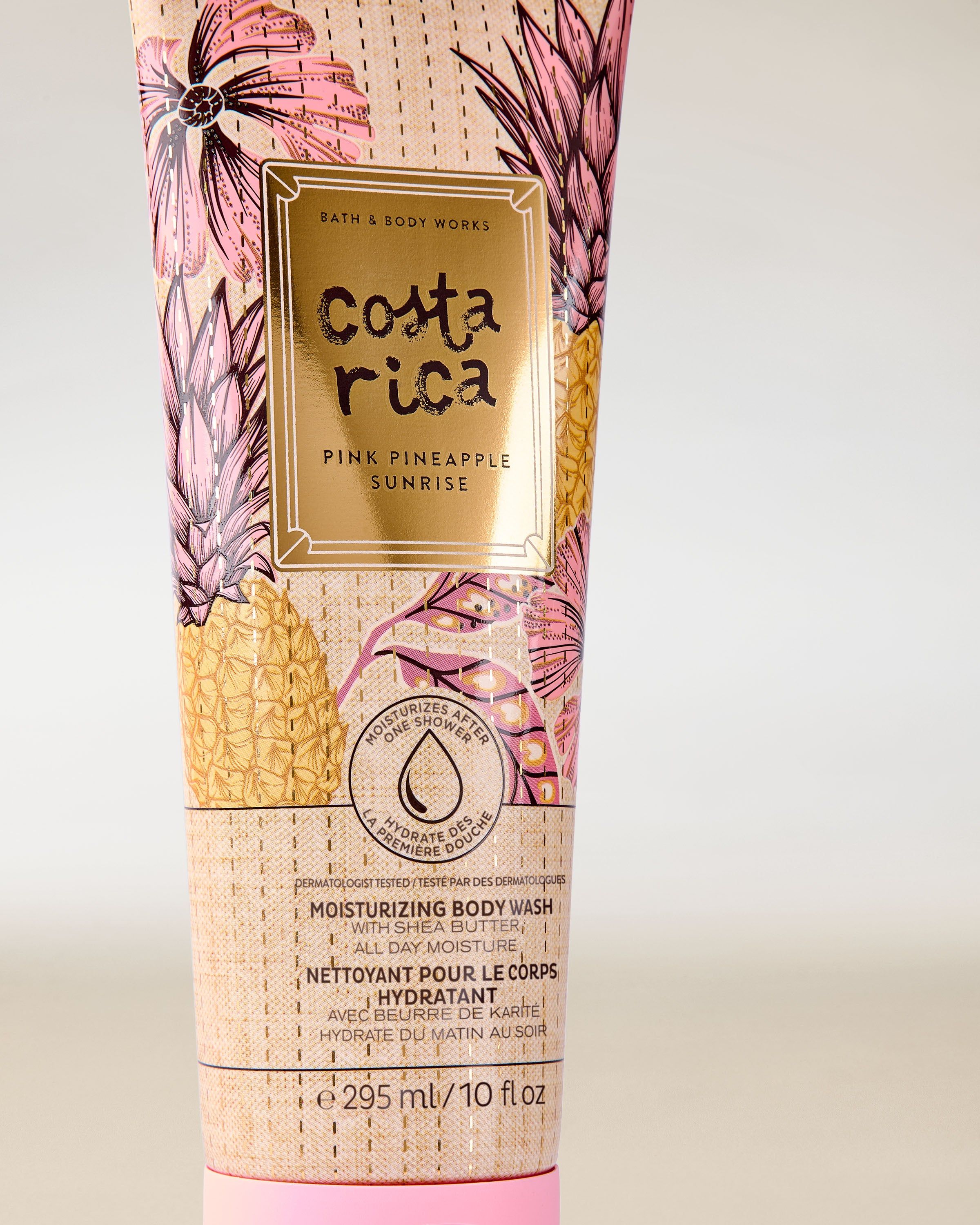 Nawilżający żel pod prysznic Costa Rica Pink Pineapple Sunrise w tubie z tropikalną grafiką ananasa i różowymi akcentami.