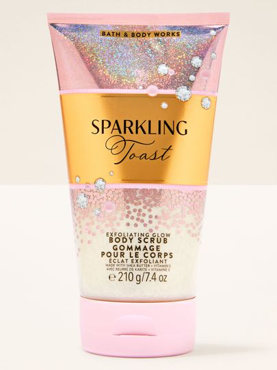 Peeling do ciała Sparkling Toast Bath & Body Works w różowo‑złotej tubie z błyszczącą etykietą