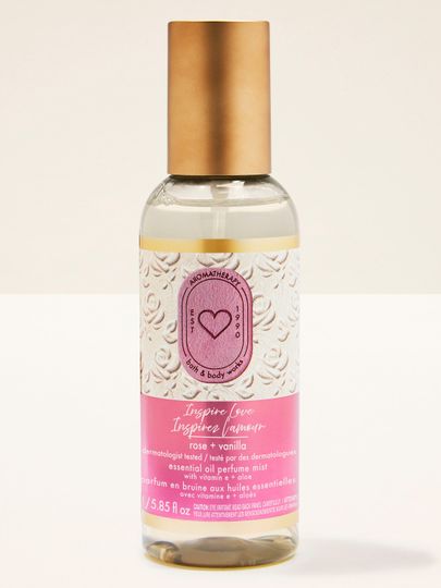 Inspire Love rose + vanilla – mgiełka o różowo‑waniliowym aromacie w eleganckiej butelce ze złotą nakrętką.