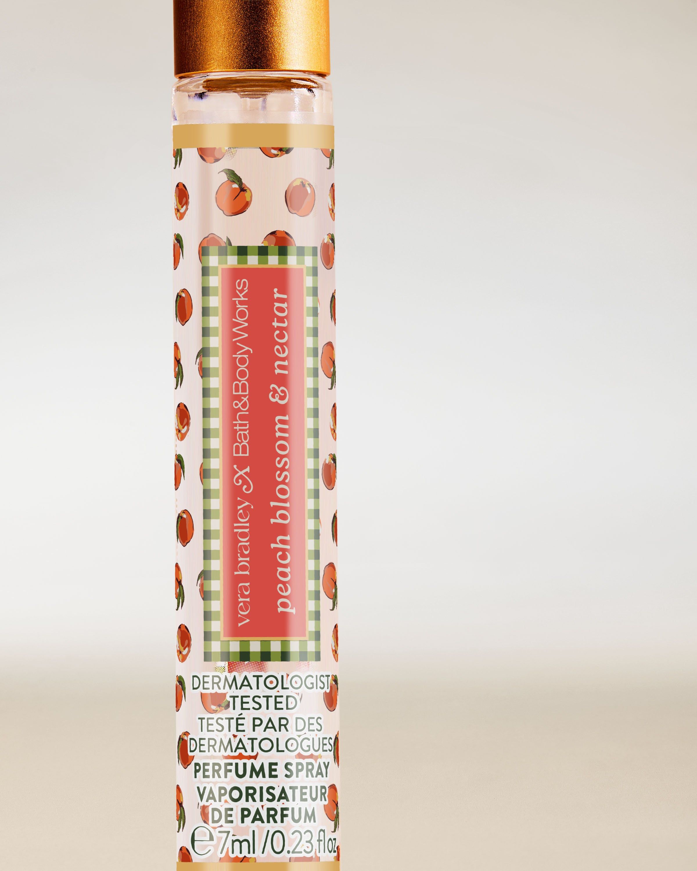 Bath & Body Works Peach Blossom & Nectar – mini perfumy w sprayu w smukłym flakonie z brzoskwiniowym motywem.