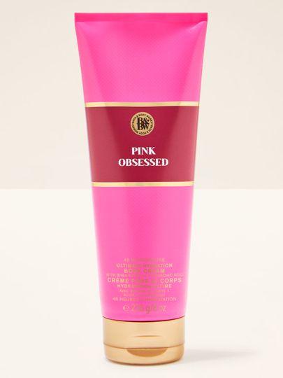 Tubka kremu do ciała Bath & Body Works Pink Obsessed (226 g) w odcieniach intensywnego różu i burgunda.