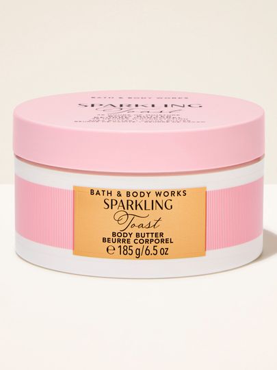 Masło do ciała Sparkling Toast Bath & Body Works w różowym pojemniku ze złotą etykietą