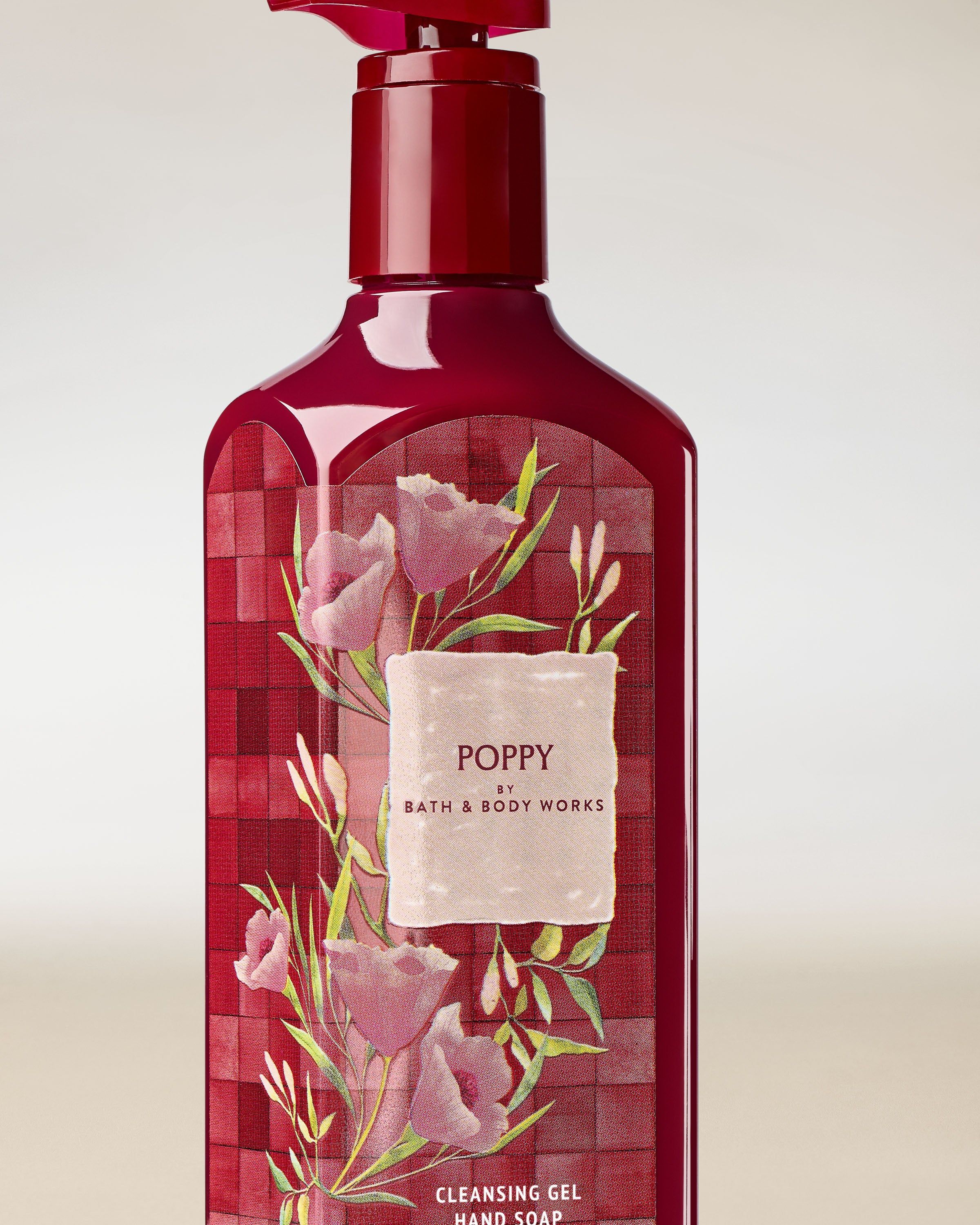 Żel do mycia rąk Bath & Body Works Poppy 236 ml w bordowej butelce z kwiatowym wzorem.