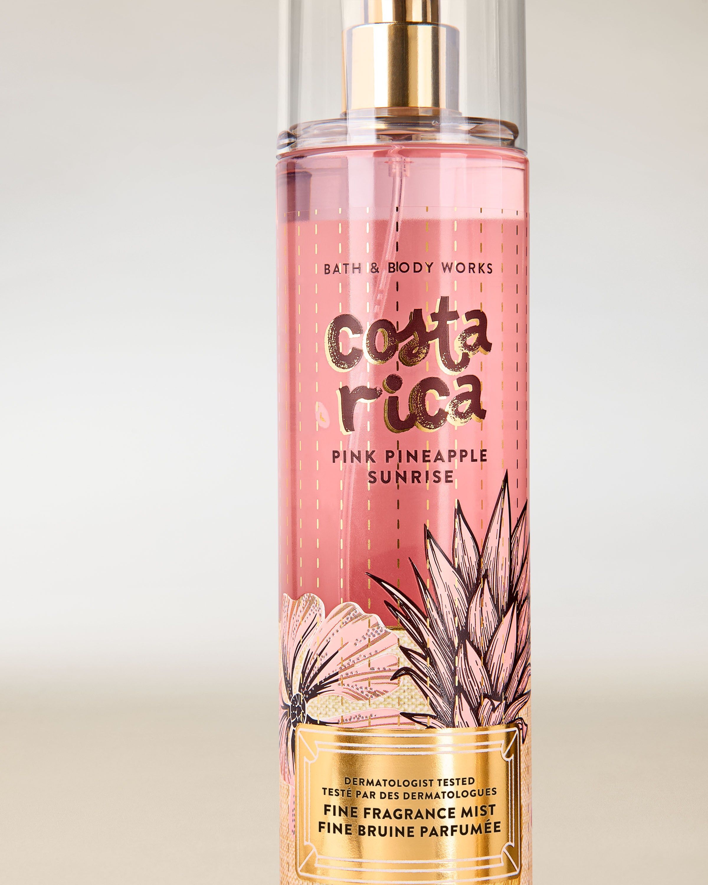Mgiełka zapachowa Costa Rica Pink Pineapple Sunrise od Bath & Body Works w różowej butelce z atomizerem i tropikalną grafiką.