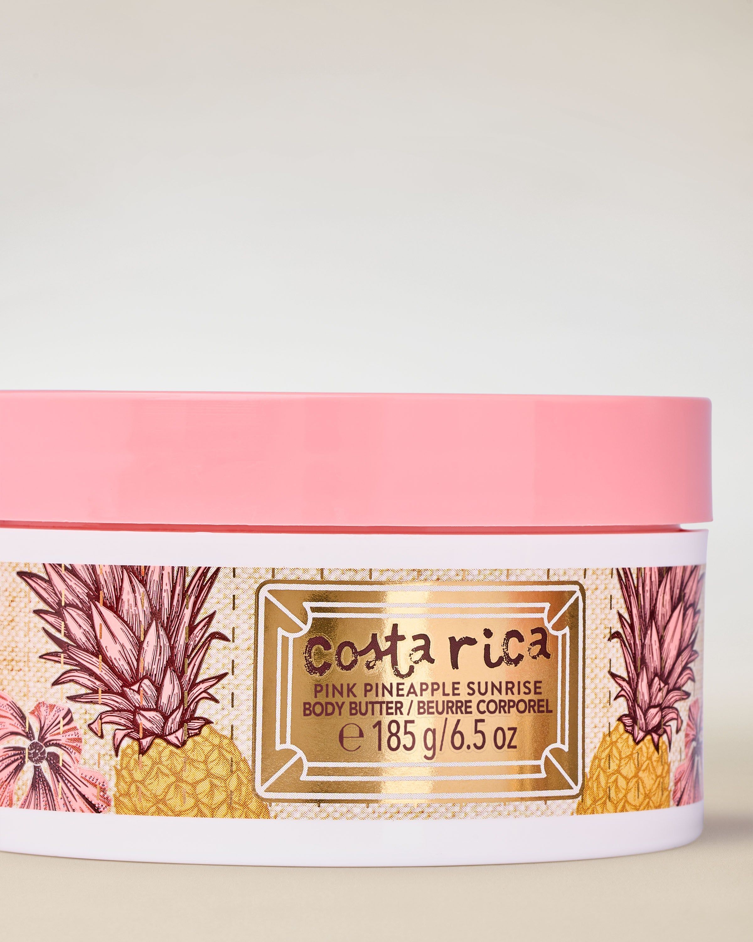 Masło do ciała Bath & Body Works Costa Rica Pink Pineapple Sunrise z motywem ananasów.