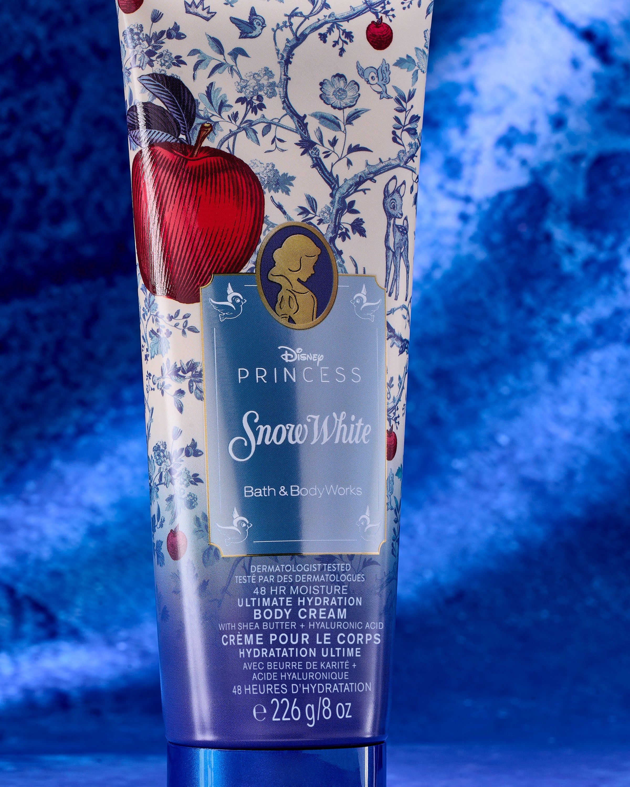 Krem do ciała Snow White Disney Princess – niebieski design z jabłkiem i 48h nawilżenia.