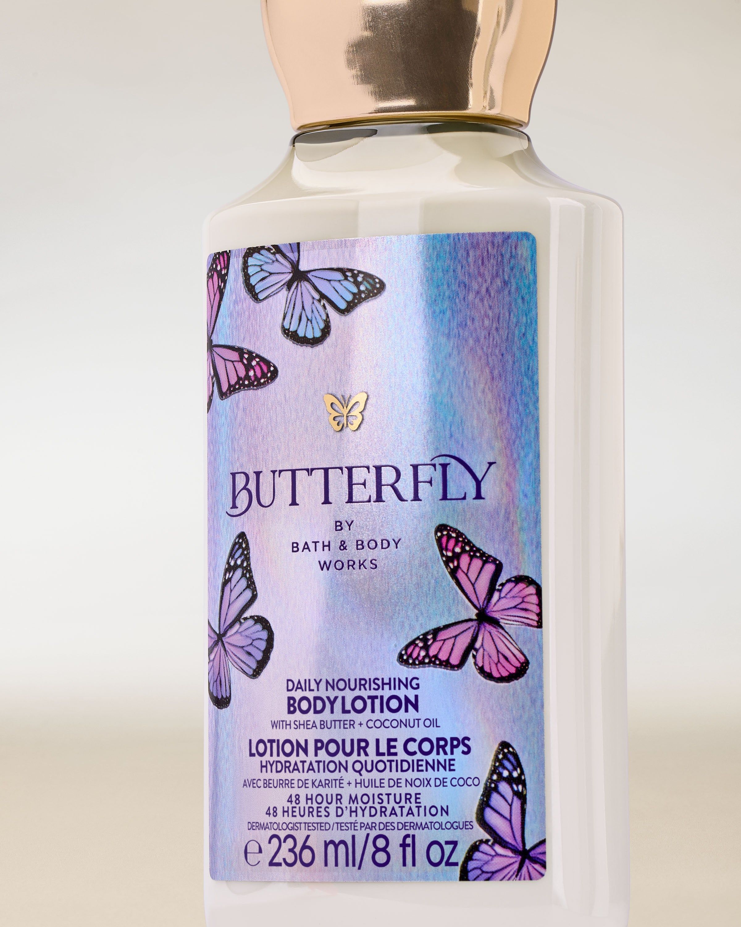 Balsam do ciała Butterfly Bath & Body Works w jasnej butelce z holograficzną etykietą i motywem motyli