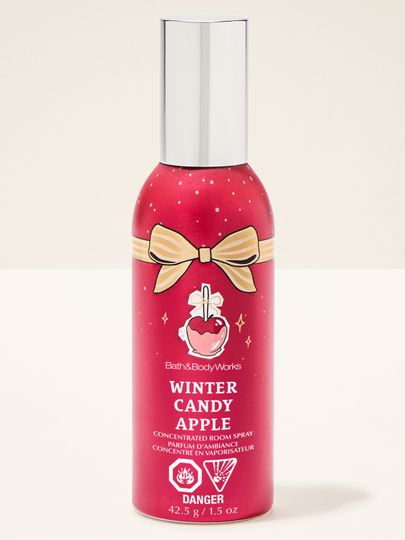 Perfumowany spray do pomieszczeń Winter Candy Apple Bath & Body Works z motywem karmelizowanego jabłka i kokardy