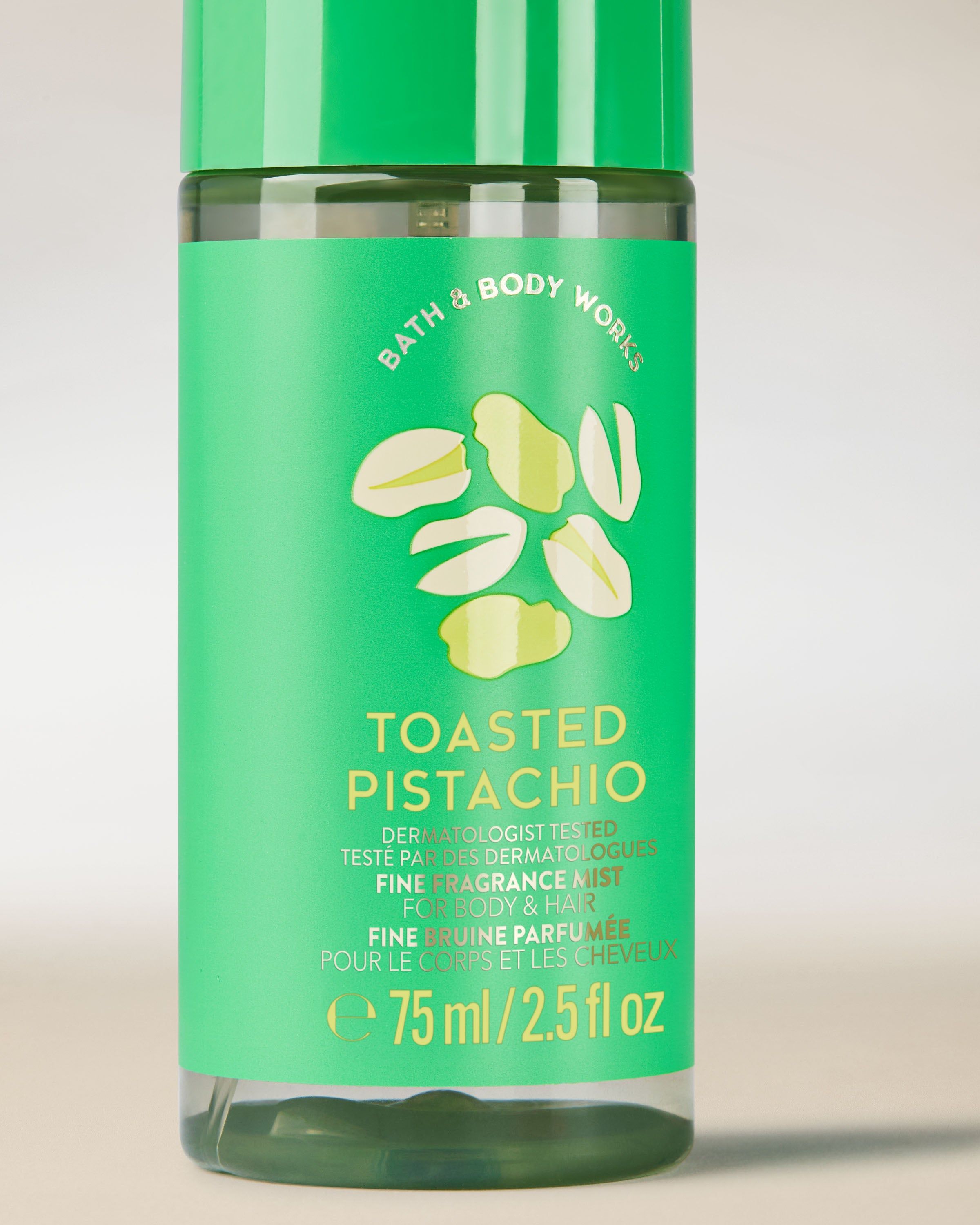 Perfumowana mgiełka do ciała i włosów Toasted Pistachio w zielonej butelce