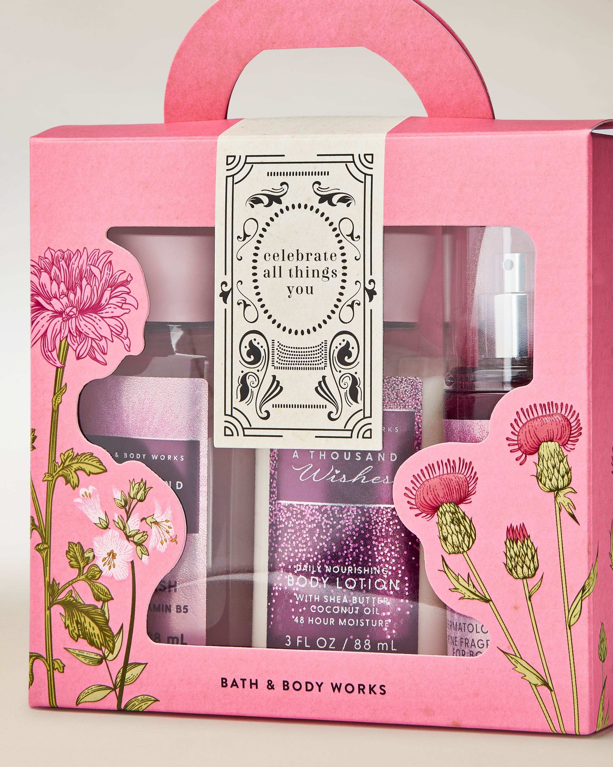 Zestaw prezentowy Bath & Body Works A Thousand Wishes z mgiełką, żelem i balsamem do ciała w pudełku z uchwytem.