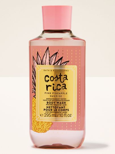 Żel pod prysznic Costa Rica Pink Pineapple Sunrise w różowej butelce z tropikalną etykietą i różowym korkiem.