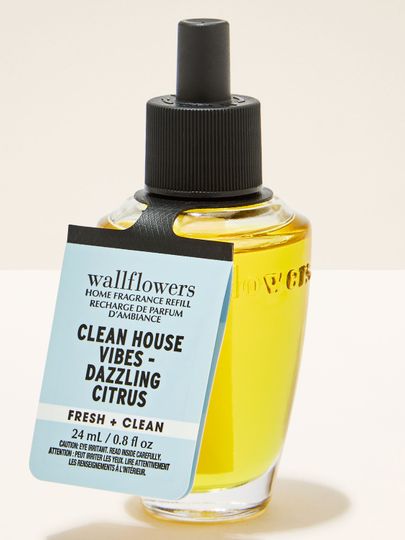 Żółty wkład do wtyczki zapachowej Wallflowers Clean House Vibes Dazzling Citrus Bath & Body Works z czarną nakrętką