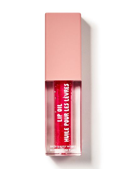 Olejek do ust Bath & Body Works "Bubblegum Pink" w prostokątnym opakowaniu z różowym płynem.