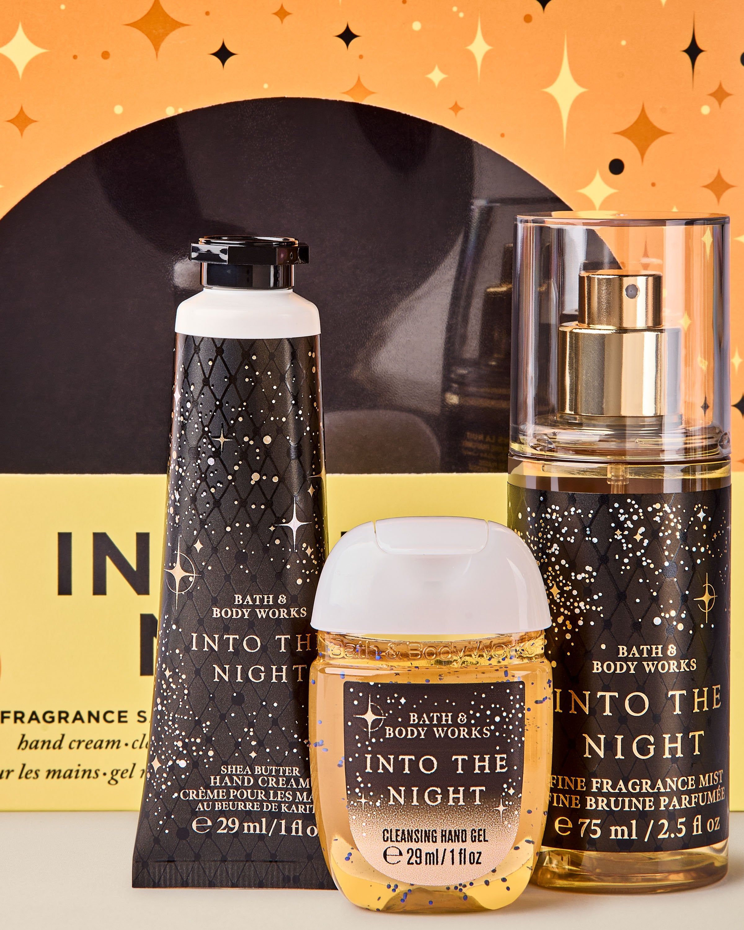 Mini zestaw Into the Night od Bath & Body Works – krem, żel i mgiełka w czarno‑złotym, gwiezdnym designie.