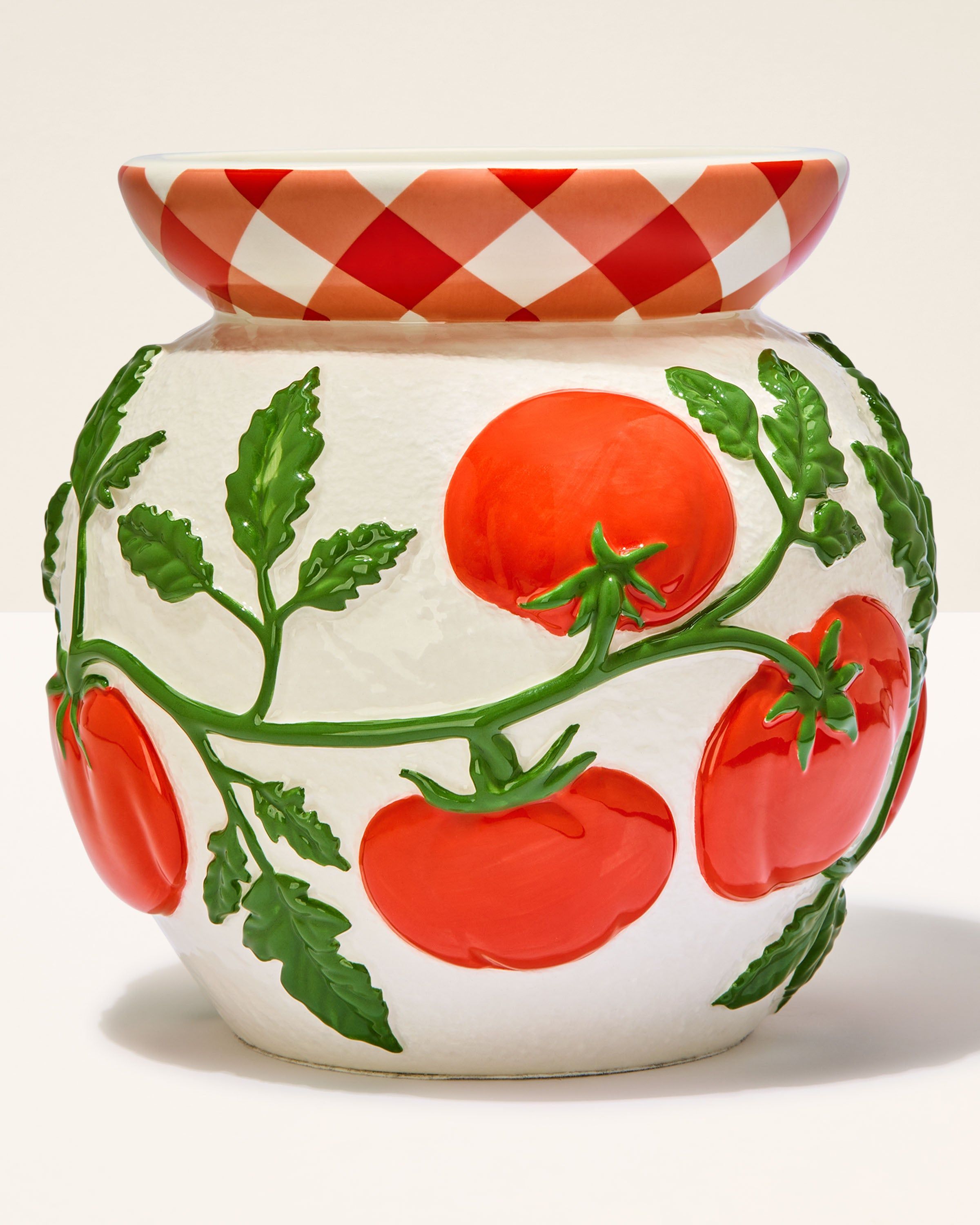 Podstawka pod świecę 3‑knotową Bath & Body Works z motywem pomidorów i czerwono‑białym wzorem.